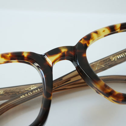 SYMPOSIUM (BROWN TORTOISE)
