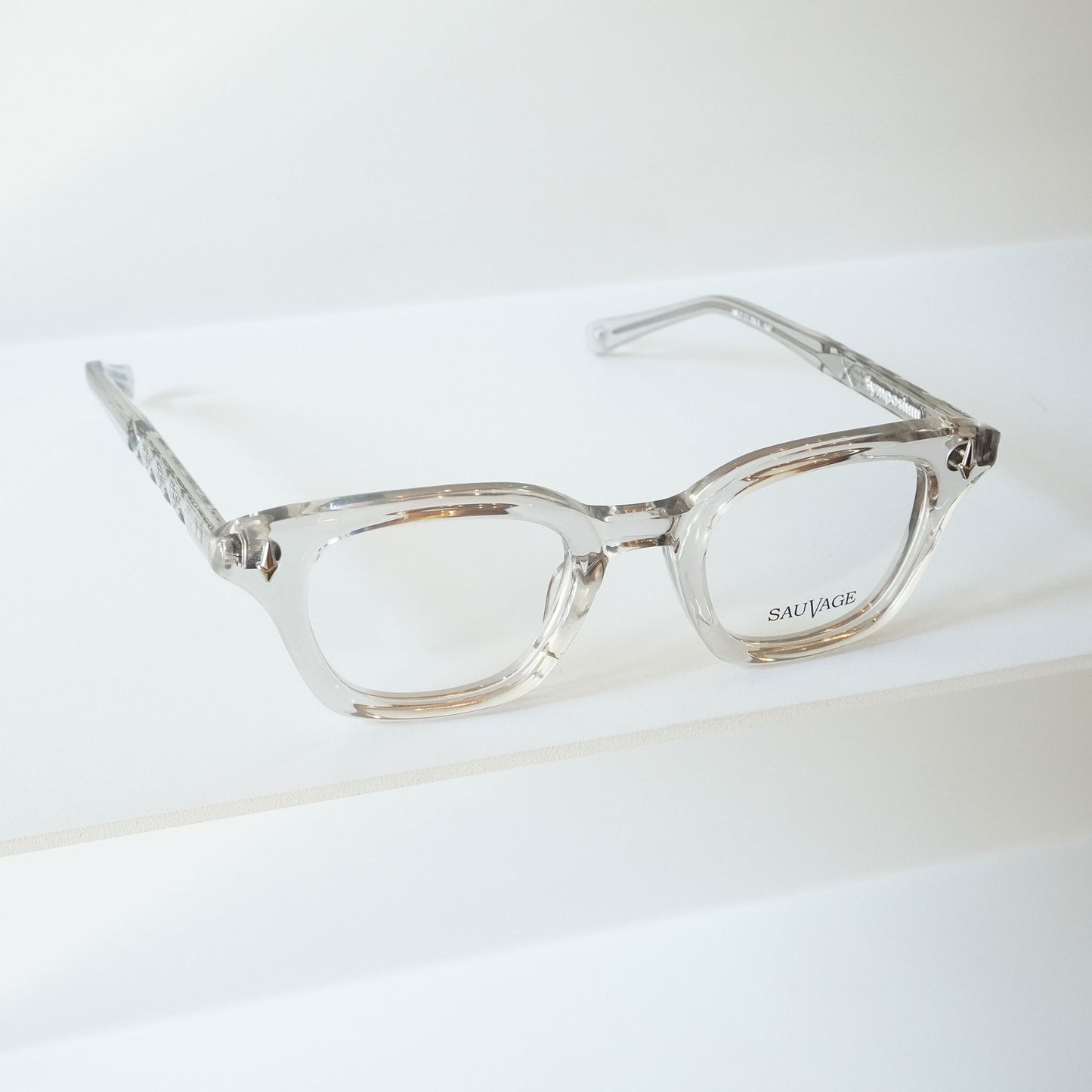 SYMPOSIUM (LIGHT GREY CRYSTAL)